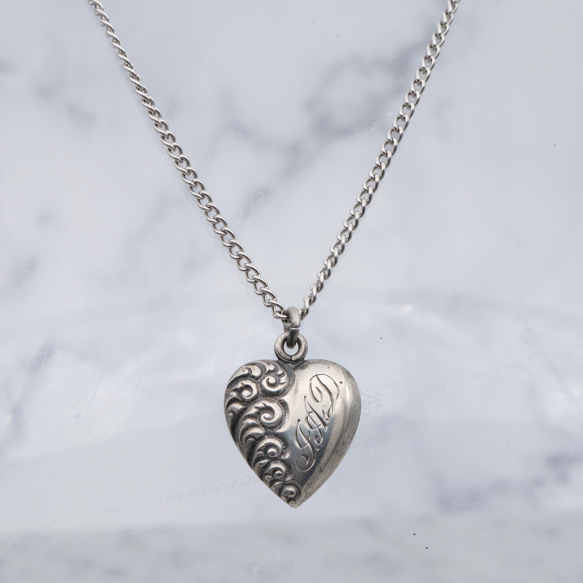 Antique Victorian repousse puffy heart charm pendant with monogram “J.A.D”